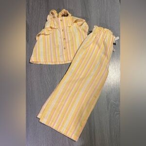 Toddler girl two piece stipe coral and peach flare pants set in size 2t.